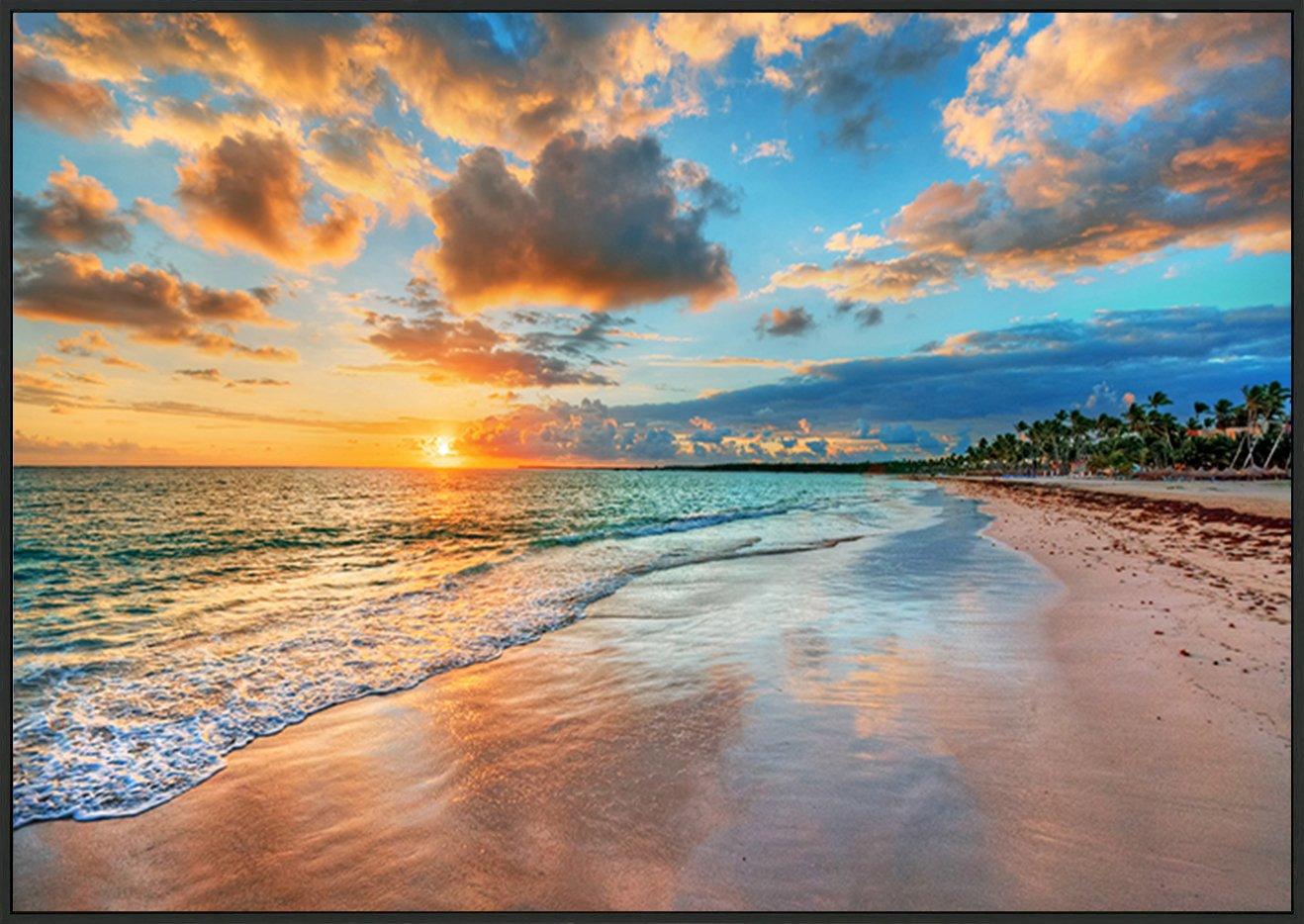 87306701 Bright and dynamic sea beach sunrise with bright blue skies and colorful clouds copy - ArtFramed