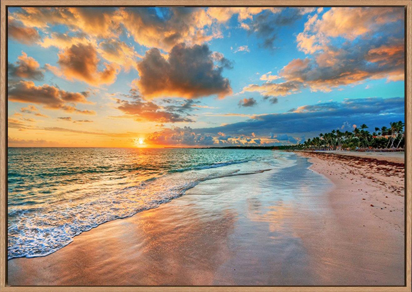 87306701 Bright and dynamic sea beach sunrise with bright blue skies and colorful clouds copy - ArtFramed