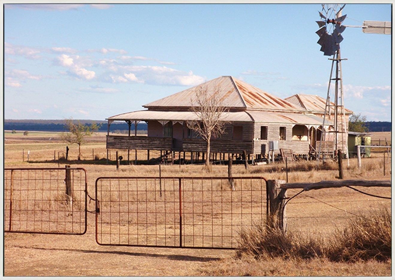 7728011 Photograph of old house in drought area of outback Queensland, Australia, showing colonial architecture, and rural surroundings copy - ArtFramed