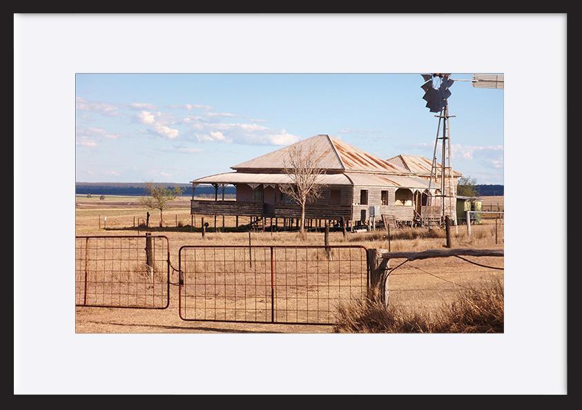 7728011 Photograph of old house in drought area of outback Queensland, Australia, showing colonial architecture, and rural surroundings copy - ArtFramed