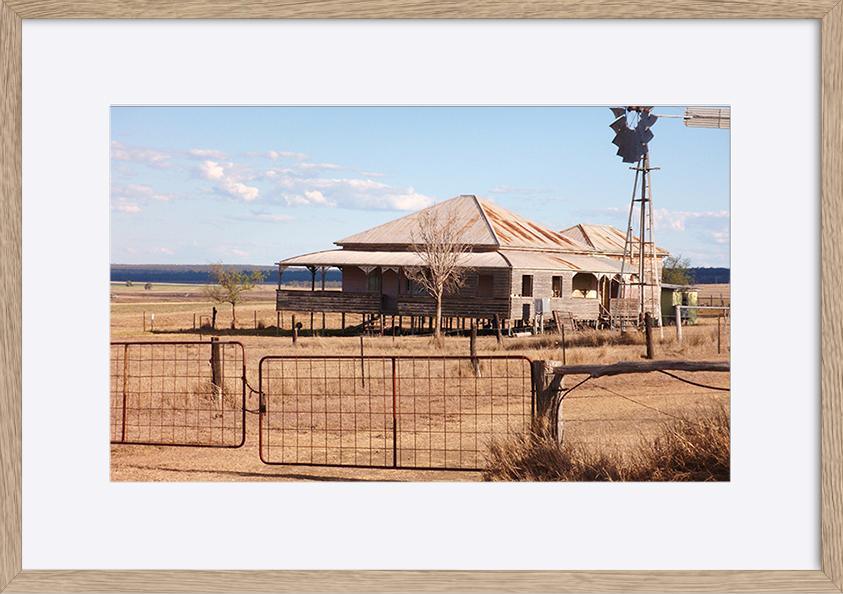 7728011 Photograph of old house in drought area of outback Queensland, Australia, showing colonial architecture, and rural surroundings copy - ArtFramed