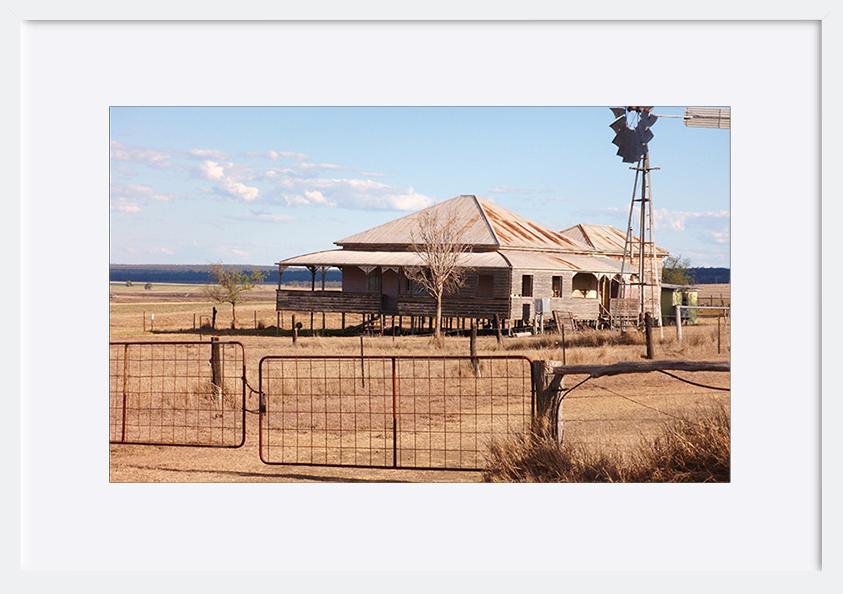 7728011 Photograph of old house in drought area of outback Queensland, Australia, showing colonial architecture, and rural surroundings copy - ArtFramed